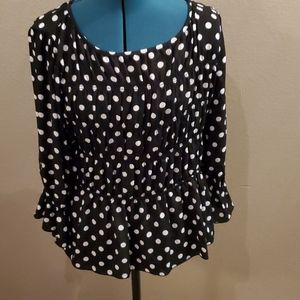 Ruffled gathered black and white polka dot blouse